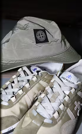 Stone Island bucket hat styled with sneakers